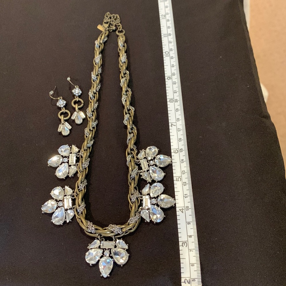 White crystal Chucky necklace by Lane Bryant with matching earrings